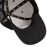 Black cap with mesh back and decorative elements on a white background